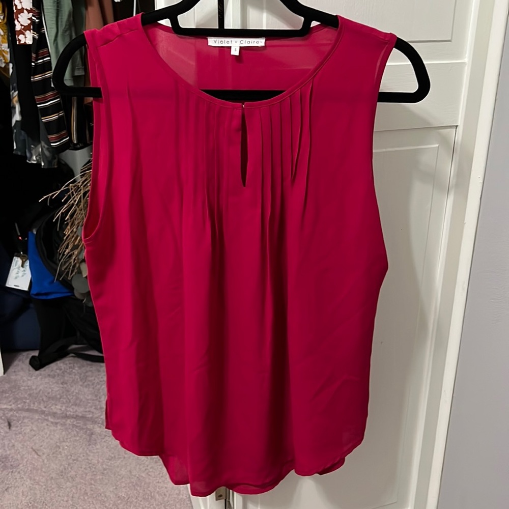 Pink sleeveless blouse